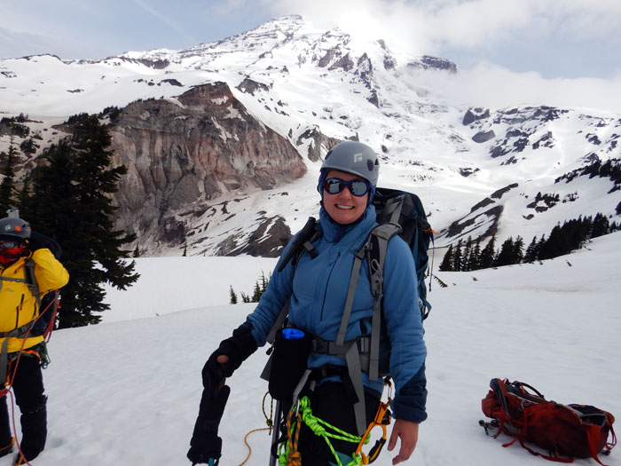 team member ready to go for summit